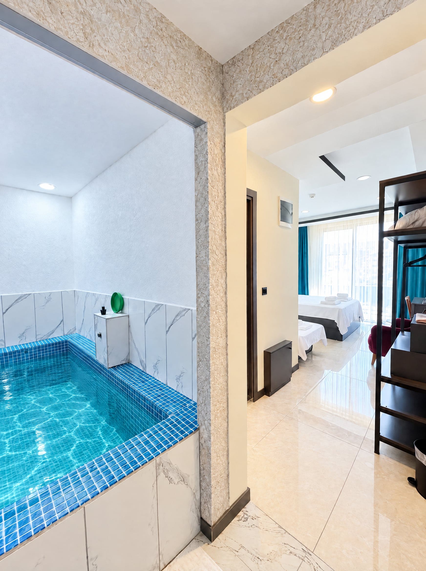 Deluxe Suite: private thermal pool in its own alcove and the bedroom